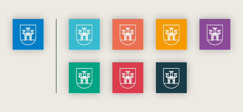 Grå platta med logotypen i olika färger.